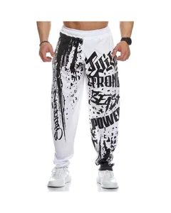 Full-length view of men's loose quick-dry sweatpants with bold black graphic prints.