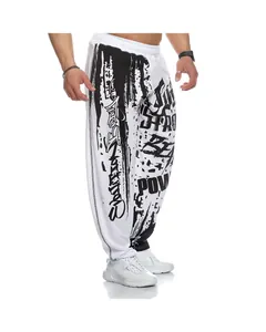 Detailed view of men's loose quick-dry sports pants with bold black graffiti print