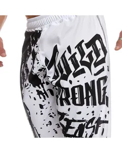 Detailed view of men's breathable mesh sports pants featuring bold black graffiti print