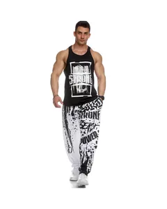 Men's loose quick-dry gym joggers featuring bold black and white ink splash prints