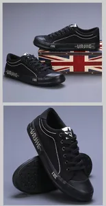 Detailopname van zwarte canvas sneakers met ademende stof en duurzame rubberen zool.