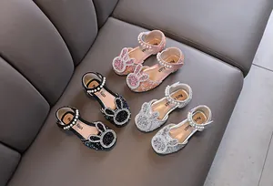 Girls' glittery princess shoes with cartoon rabbit and pearl details in three colors.