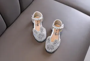 Sparkly silver girls princess shoes with rhinestone rabbit ears and pearl straps