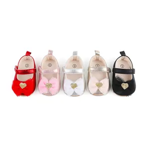 Group of five toddler girl dress shoes in various colors with glitter heart bows