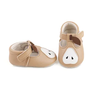 Chaussures de marche pour bébé kaki avec motif poire et semelles en caoutchouc antidérapantes.