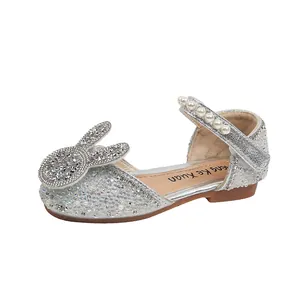 Sparkly silver princess shoes for girls with rhinestones and pearl bunny ear detail