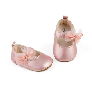 Pink metallic baby girl princess shoes with a delicate lace bow and anti-slip rubber sole