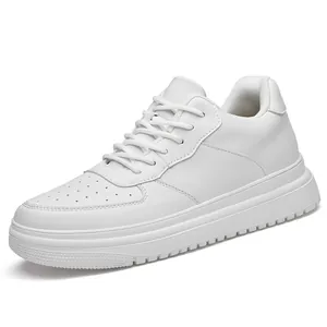 All-white platform casual sneakers with lace-up closure and perforated toe cap detail