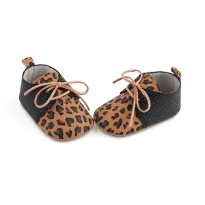 Detail view of leopard print baby walking shoes with anti-slip rubber soles