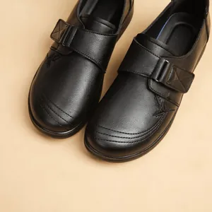 Comfortable black leather walking shoes for women with soft sole and embroidery detail
