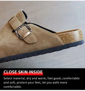 Detailed view of the suede leather and buckle on these comfortable clogs.