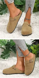 Detailed view of women's camel suede clogs featuring an adjustable buckle strap and cork sole.