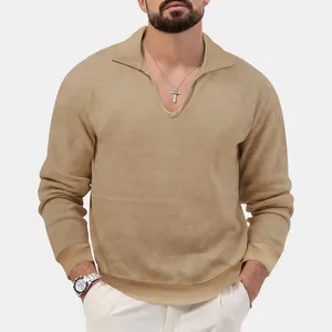 Detailed view of men's camel waffle knit polo shirt with stylish V-neck lapel