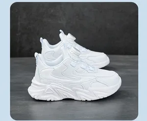 Side view of children's white sports shoes featuring a convenient rotary dial lacing system