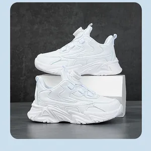 Side detail of white children's sneakers with rotating buckle lacing