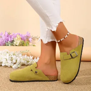 Stylish lime green women's clogs featuring adjustable buckle strap and comfy cork sole.