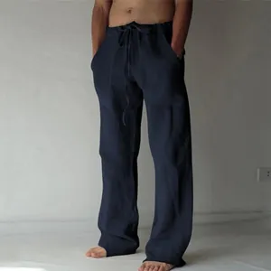Détail du pantalon large en coton et lin bleu marine pour homme avec cordon