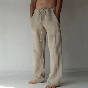 Détail du pantalon ample pour homme en coton et lin avec taille à cordon de serrage.