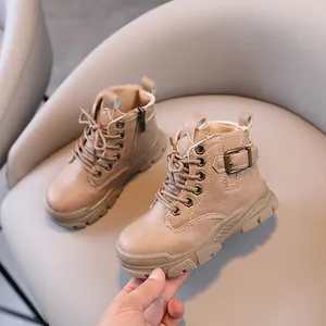 Classic tan children's Martin boots with side zipper and durable lug sole for autumn/winter