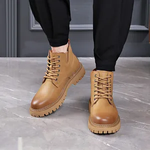Stylish tan men's work boots with non-slip gum sole and classic lace-up design for men
