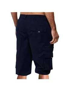 Back view of loose fit men's dark blue cargo shorts with multiple utility pockets on white