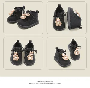 Vues multiples de bottines matelassées noires pour bébé avec fleur 3D et décorations