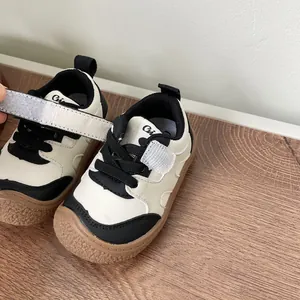 Toddler walking shoes with soft rubber sole and adjustable Velcro strap, sizes 17 to 27