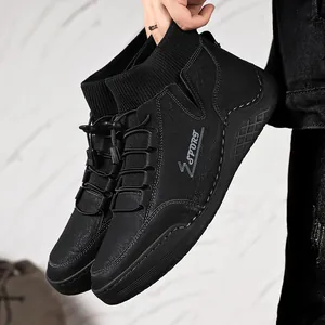 Detail of black men's Martin boots featuring a comfortable elastic sock collar.