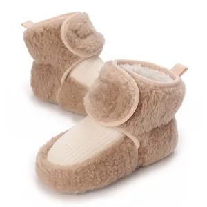 Detailed view of cozy fleece-lined baby winter boots with soft soles and velcro strap