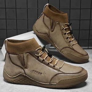 Detail view of khaki men's outdoor Martin boots featuring a knitted ankle collar