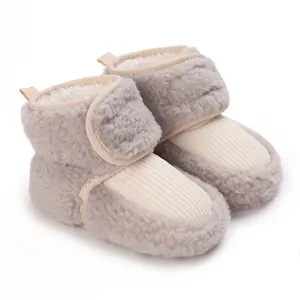 Cozy fleece-lined baby winter boots with velcro closure and ribbed knit toe detail