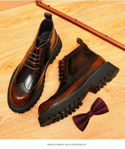 Detailed close-up view of men's brown leather wingtip brogue boots with thick lug soles