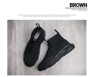 Detail view of black high-top knit sneakers with breathable mesh and platform soles.