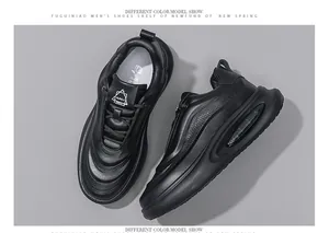 Detail view of premium black leather chunky sneakers for men with breathable design.