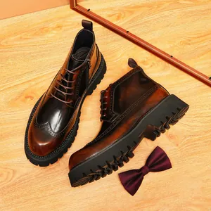 Classic men's brown leather wingtip brogue boots with side zipper and thick sole