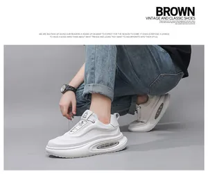 Detailed side view of white breathable leather dad sneakers with air cushion sole