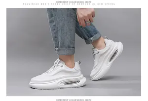 Detailed side view of men's white breathable leather chunky sneakers with air cushion