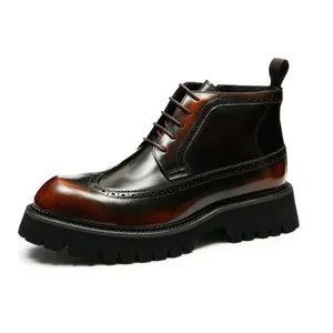 Elegant men's brown leather Brogue boots with thick lug sole and wingtip carved detail