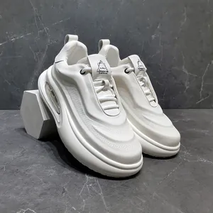 Detail of white genuine leather chunky sneakers with air cushion and breathable holes