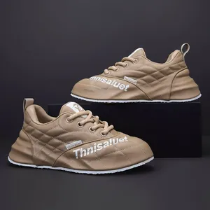 Eleganti scarpe sportive casual da uomo in pelle color cuoio con marchio Thnisaluet