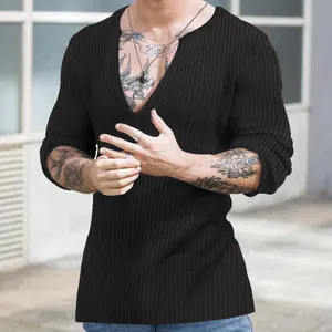 Detailed close-up of men's deep V-neck long sleeve ribbed knit shirt in black slim fit
