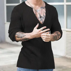 Detail of a black slim fit long sleeve ribbed knit shirt for men with deep V-neckline