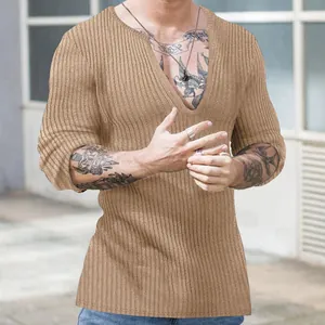Close-up of men's slim fit deep V-neck long sleeve ribbed knit sweater in khaki