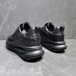 Rear profile of black genuine leather chunky sneakers with thick sculpted soles