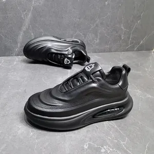 Macro detail of black genuine leather men's chunky dad sneakers with air cushion sole
