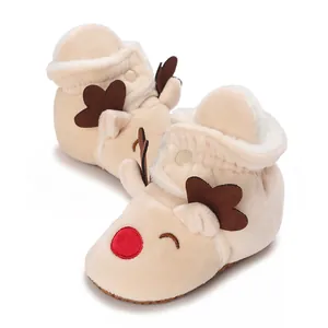 Close-up of adorable baby winter reindeer snow boots featuring soft thick velvet lining
