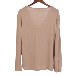 Back view detail of a men's thin V-neck ribbed knit long sleeve T-shirt in light tan