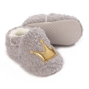Close-up detail of soft fuzzy grey baby shoes featuring fleece lining and non-slip sole