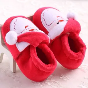 Festive red infant winter warm plush snow boots featuring a cute Santa Claus design