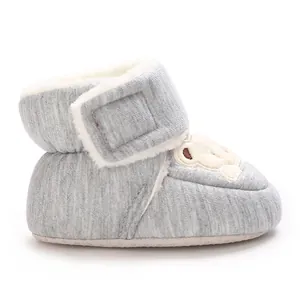 Side view of grey baby winter bootie with soft fleece lining and cute bear patch
